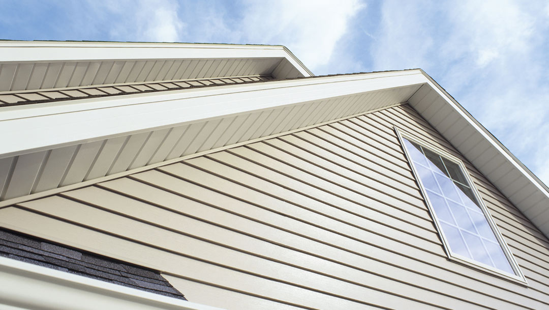 wall section tan vinyl siding with vinyl window